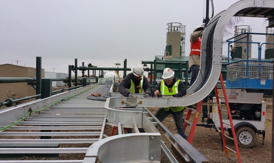 Two men working on a construction site.