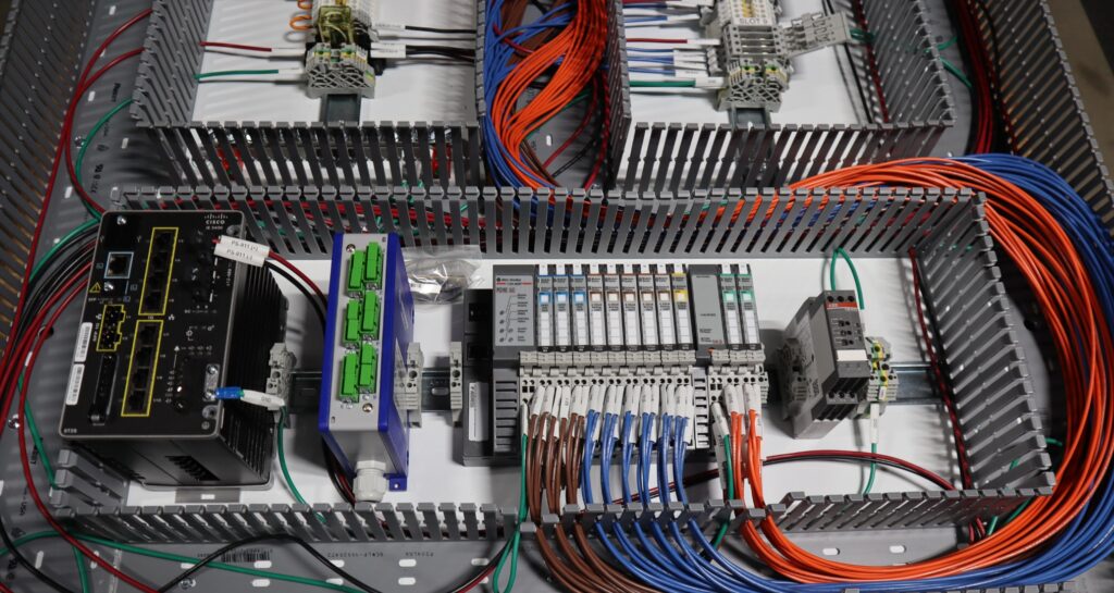 Interior of a UL 698A control panel built for Class I Division 2 environments with verified components and structured wire management.