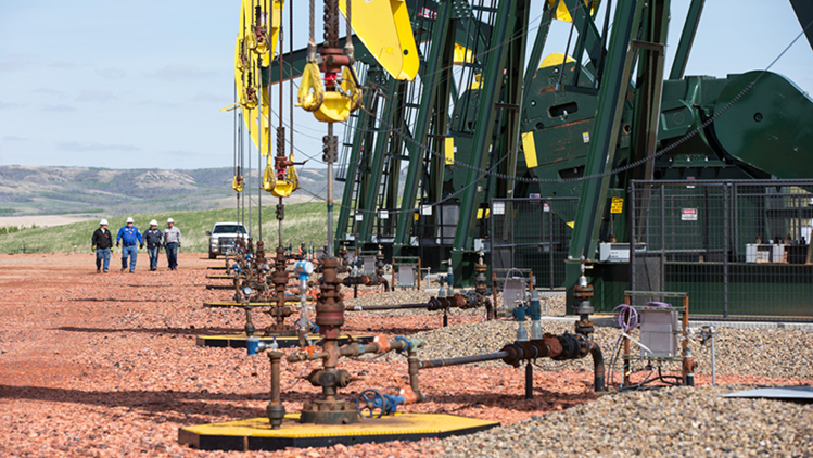 Well pad with pumpjacks and wellheads modernized with DSI regenerative drive packages
