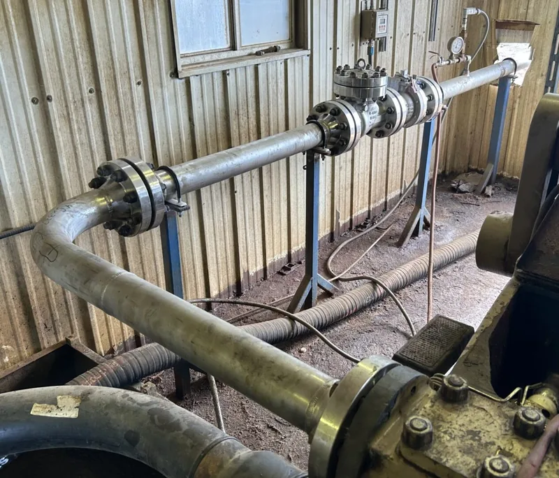 DSI field crew welded stainless pipe spool and flanged connections at a production site