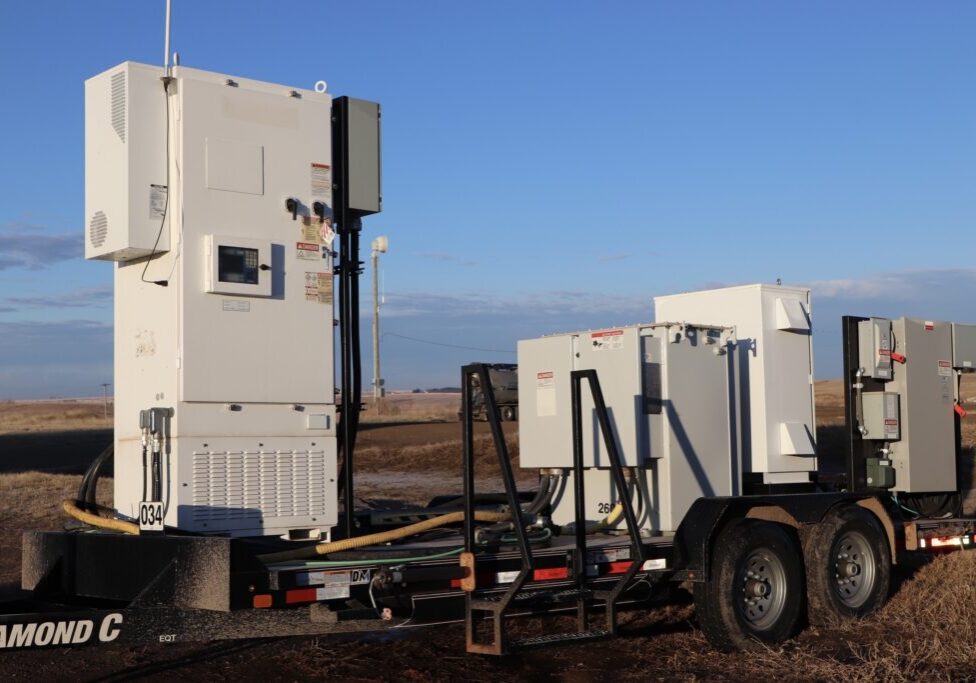 Oilfield field services integration — ESP trailer with electrical control enclosures deployed in the Bakken