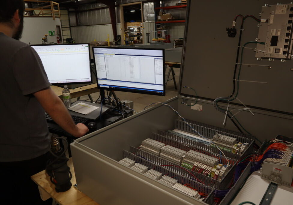 DSI technician programming a Class 1 Division 2 control panel